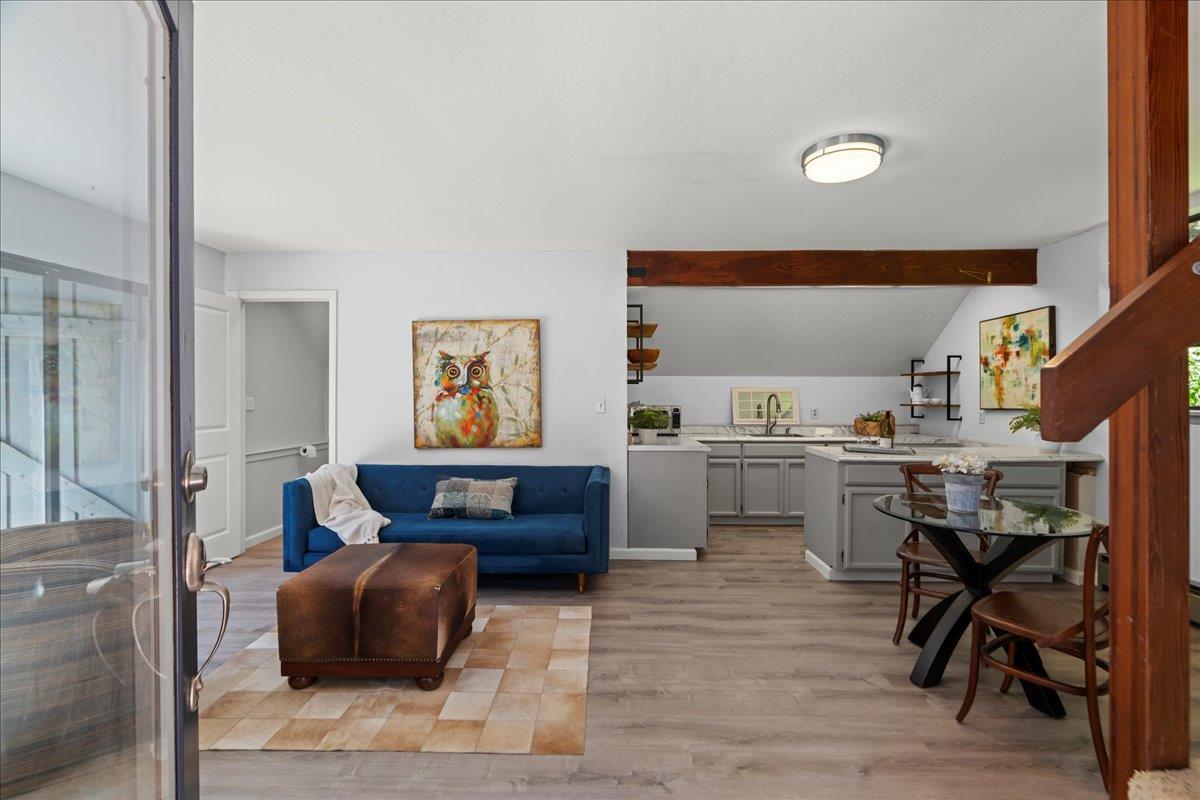 19005 Old Vineyard Road Los Gatos, CA 95033 - Photo 31 of 51 a living room with furniture and a wooden floor