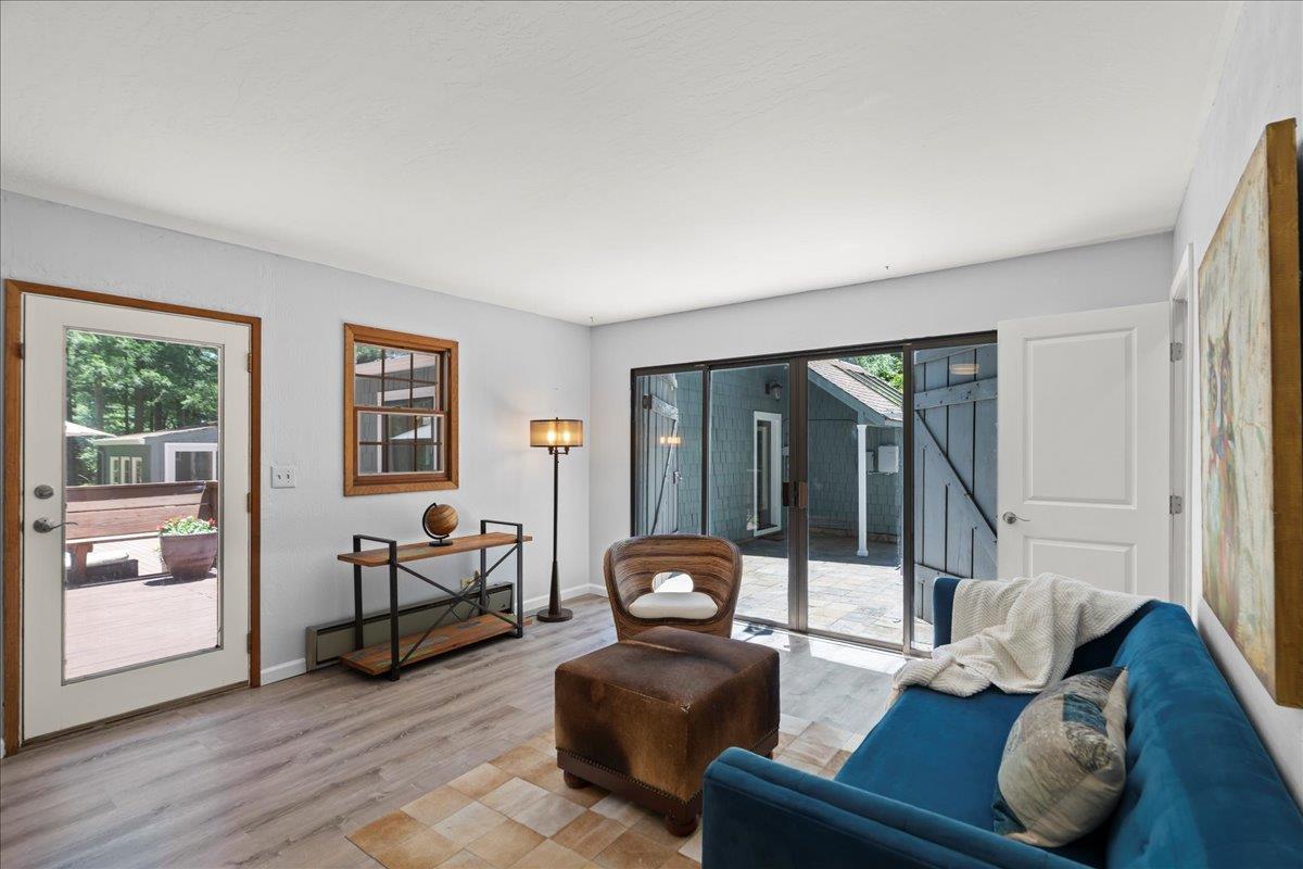 19005 Old Vineyard Road Los Gatos, CA 95033 - Photo 33 of 51 a living room with furniture and a large window