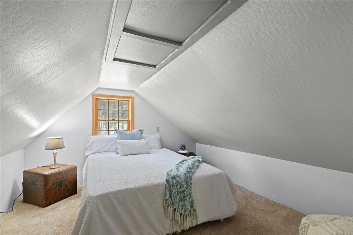 19005 Old Vineyard Road Los Gatos, CA 95033 - Photo 35 of 51 a bedroom with a bed and a window