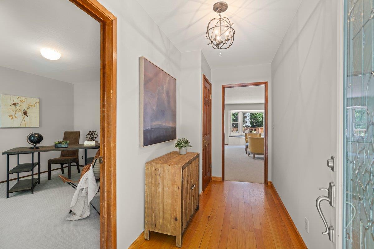 19005 Old Vineyard Road Los Gatos, CA 95033 - Photo 4 of 51 a view of entryway with livingroom and wooden floor