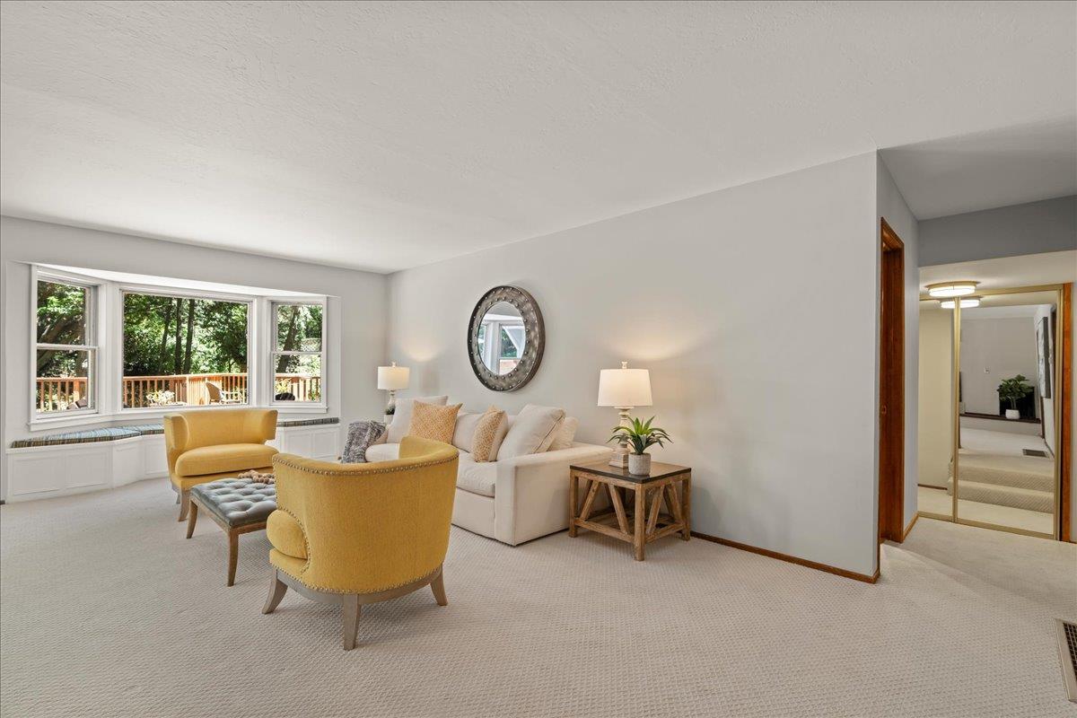 19005 Old Vineyard Road Los Gatos, CA 95033 - Photo 5 of 51 a living room with furniture and a large window