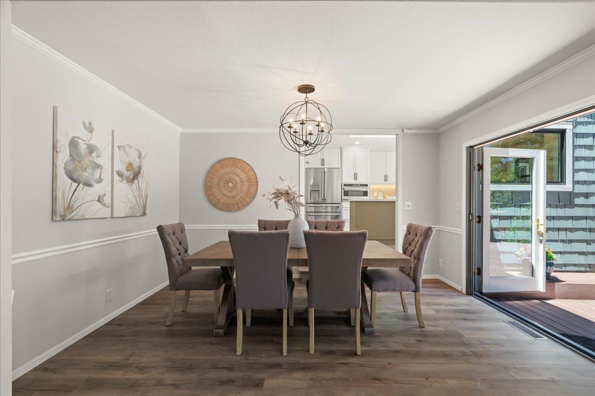 19005 Old Vineyard Road Los Gatos, CA 95033 - Photo 8 of 51 a view of a dining room with furniture window and wooden floor