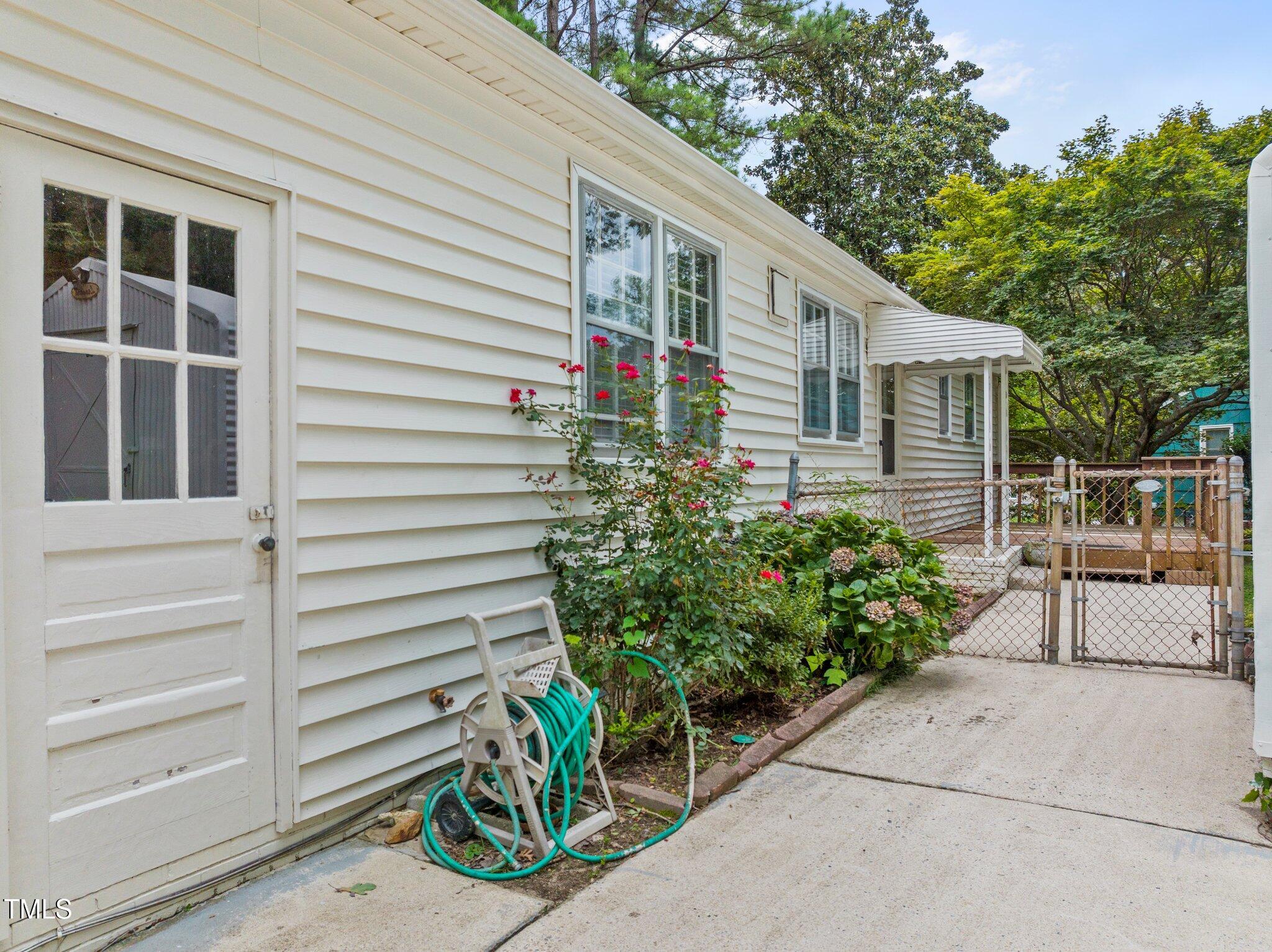 530 Banks Street Raleigh, NC 27604 - Photo 23 of 50 a front view of a house with garden