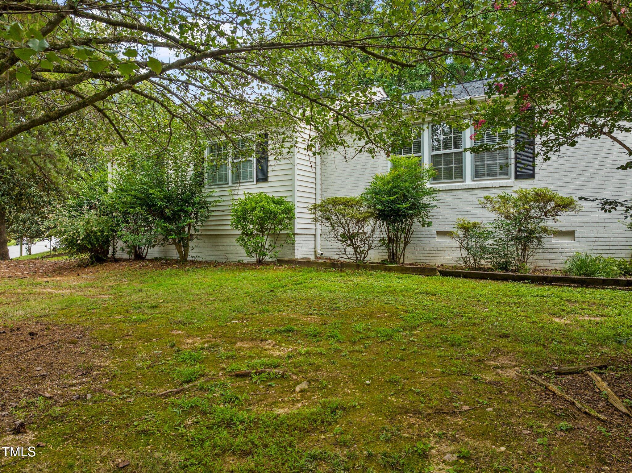 530 Banks Street Raleigh, NC 27604 - Photo 31 of 50 a view of a house with a garden