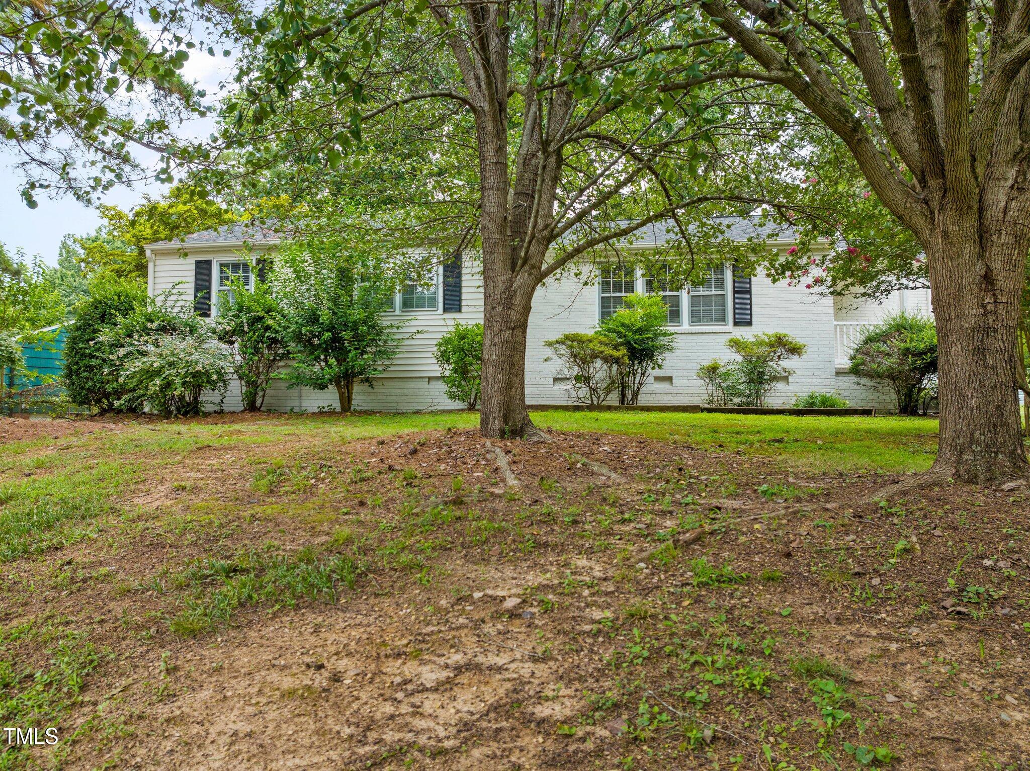 530 Banks Street Raleigh, NC 27604 - Photo 33 of 50 a view of a house with yard and tree s