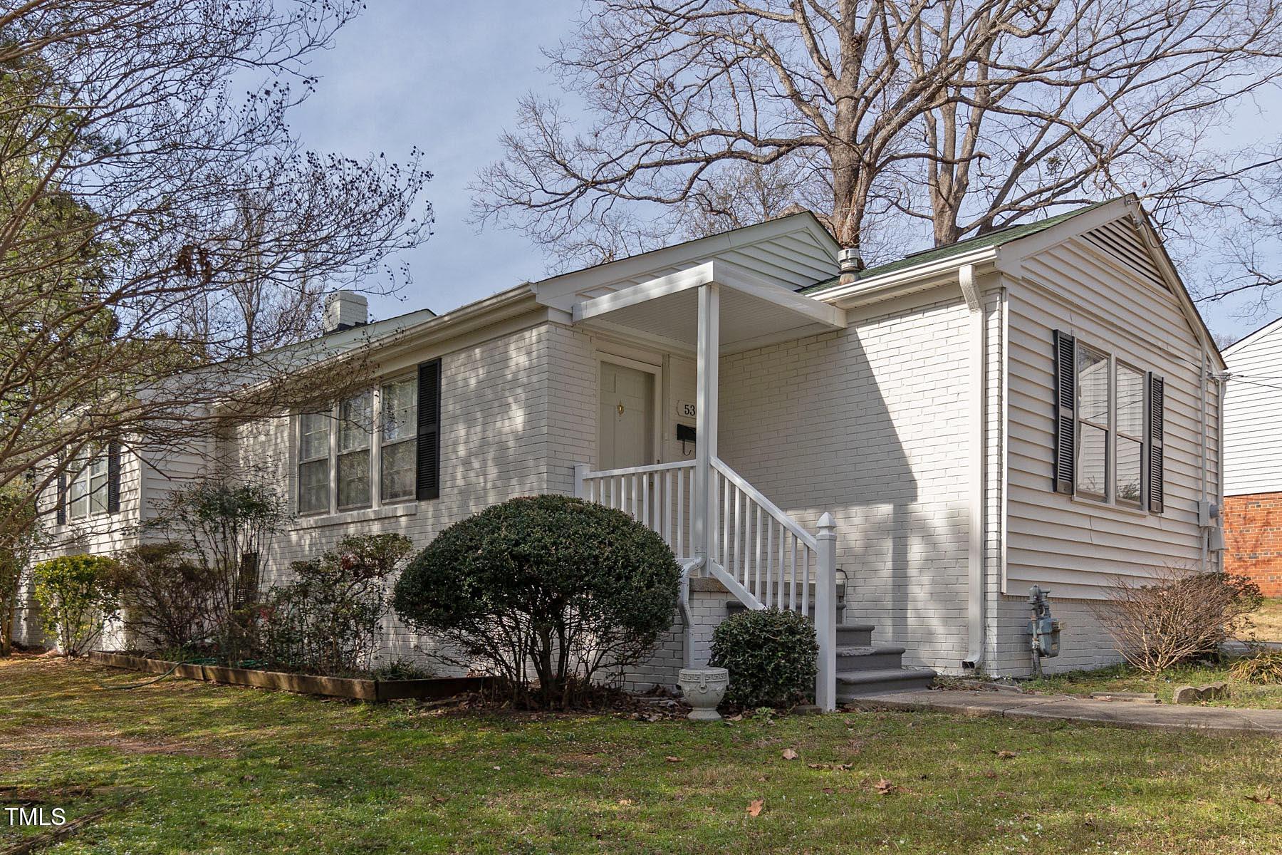 530 Banks Street Raleigh, NC 27604 - Photo 37 of 50 a front view of a house with a yard