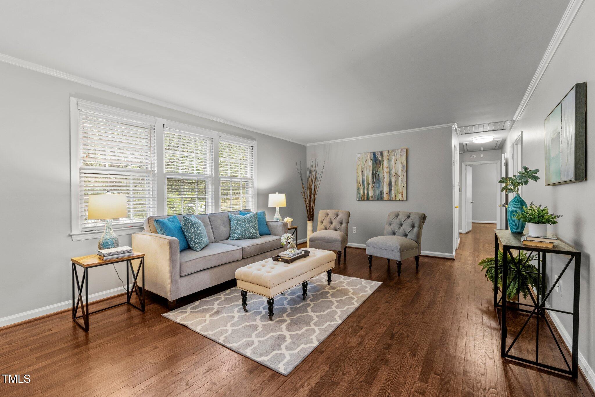 530 Banks Street Raleigh, NC 27604 - Photo 4 of 50 a living room with furniture and a wooden floor