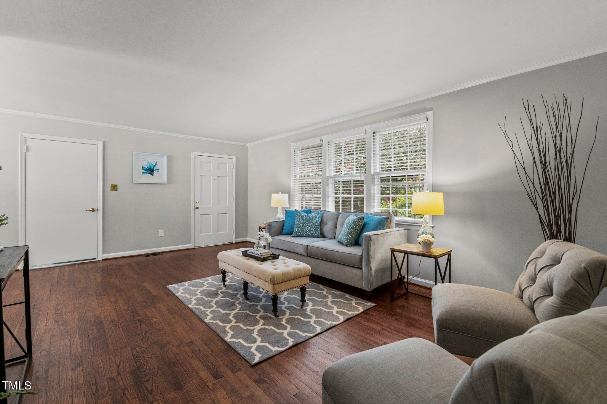 530 Banks Street Raleigh, NC 27604 - Photo 5 of 50 a living room with furniture and a wooden floor