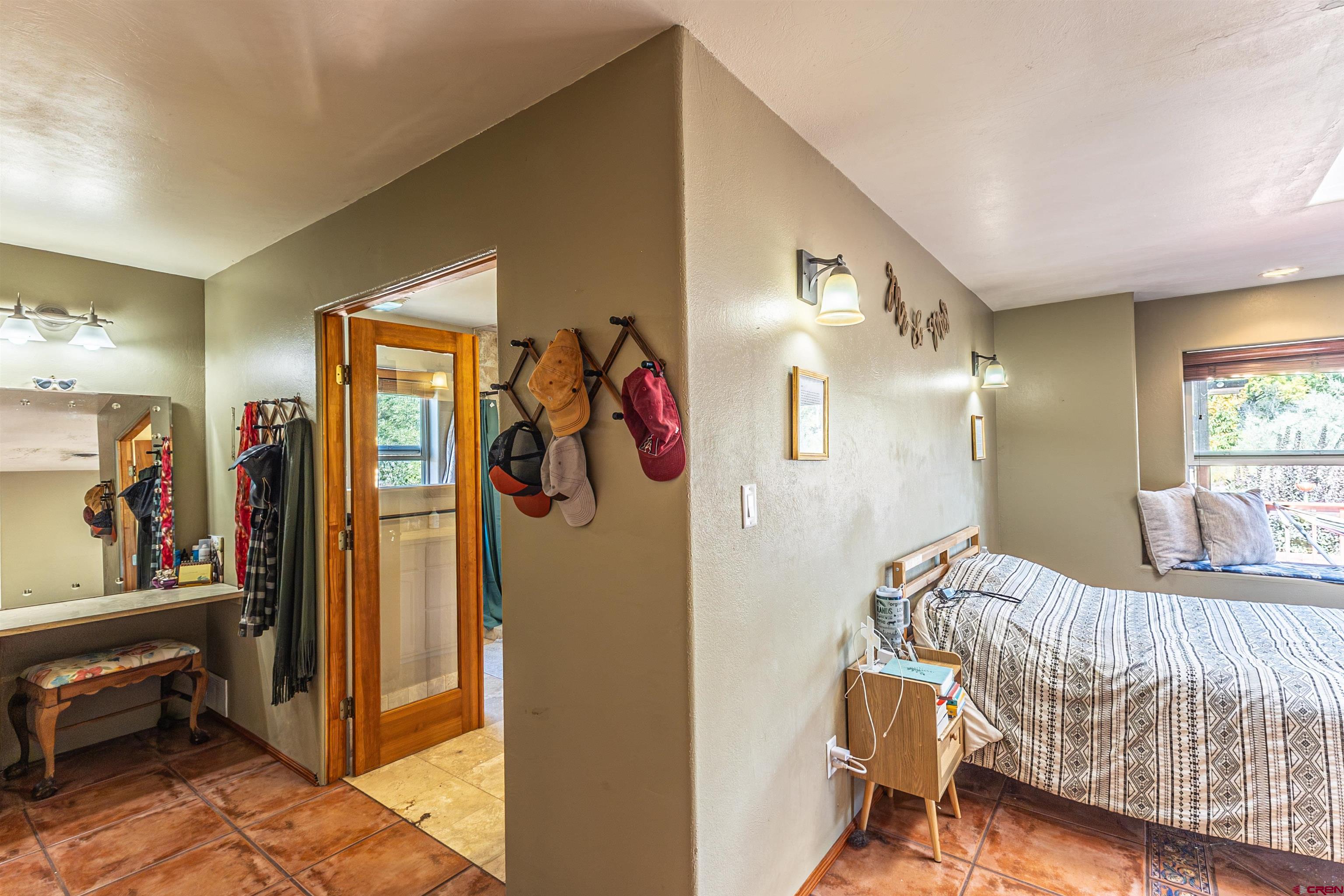 18 Road 2617 Aztec, NM 87410 - Photo 16 of 45 a bedroom with a bed and a window