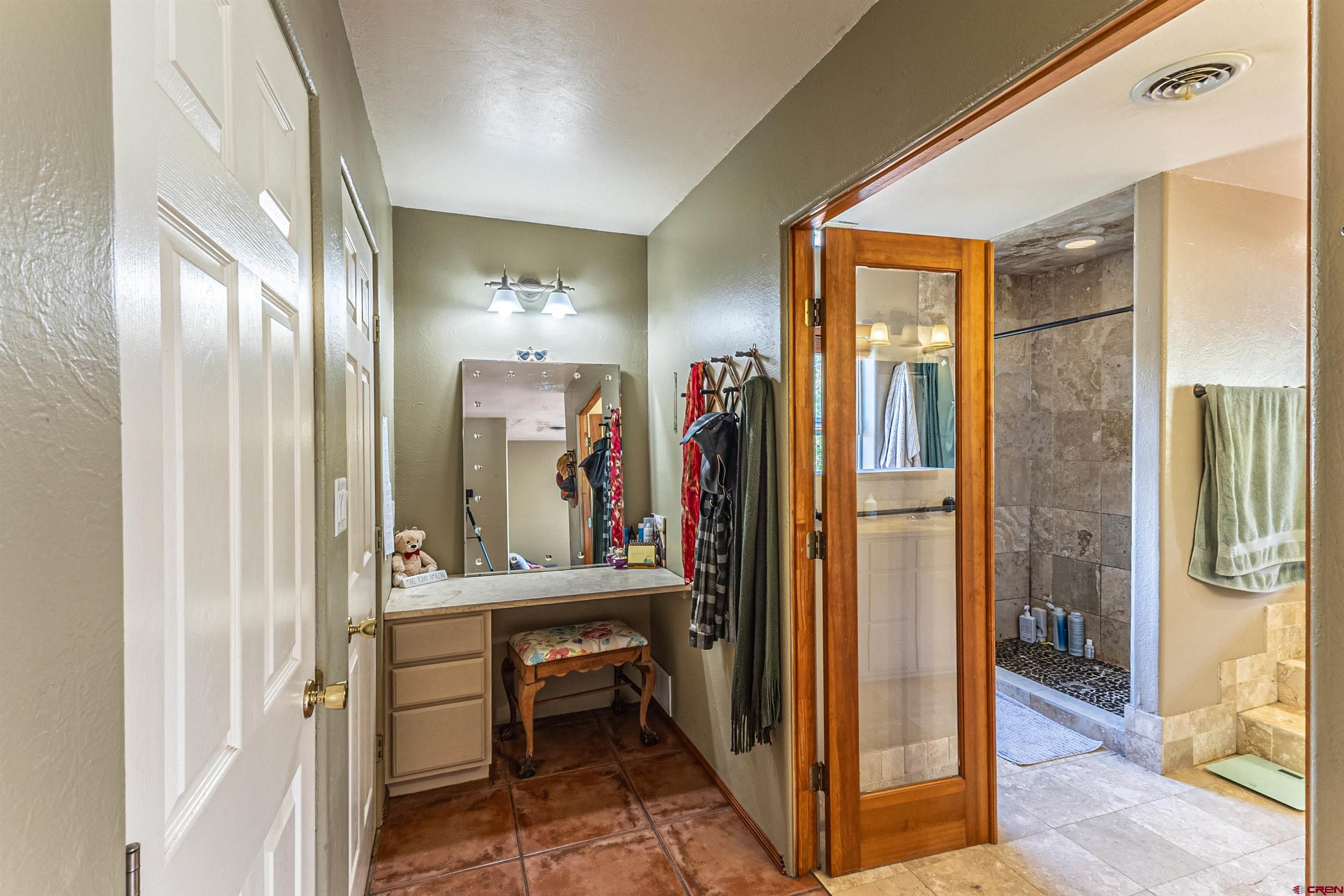18 Road 2617 Aztec, NM 87410 - Photo 18 of 45 a view of a hallway with living room and furniture