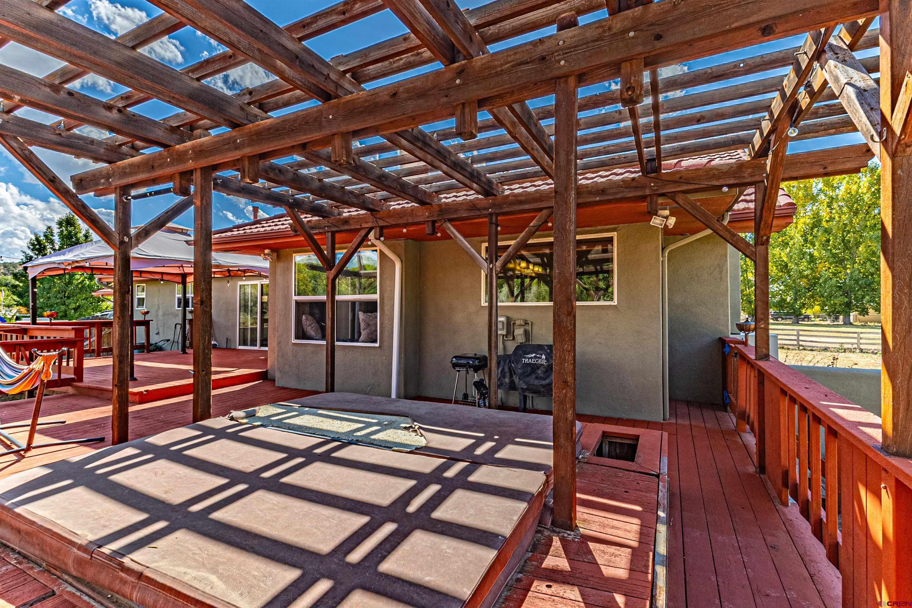 18 Road 2617 Aztec, NM 87410 - Photo 39 of 45 a view of backyard with a patio and wooden floors