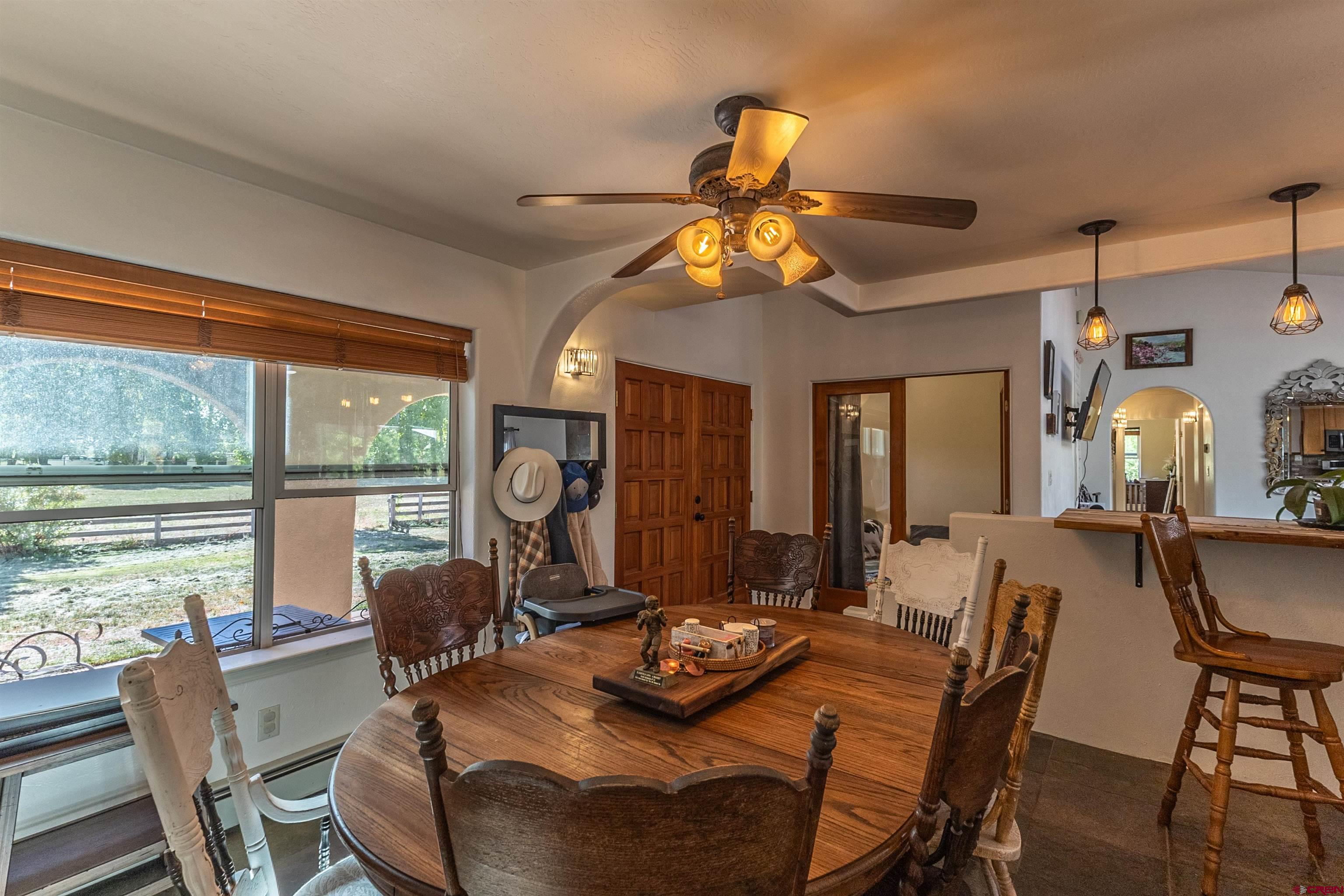 18 Road 2617 Aztec, NM 87410 - Photo 40 of 45 a view of a dining room with furniture window and outside view