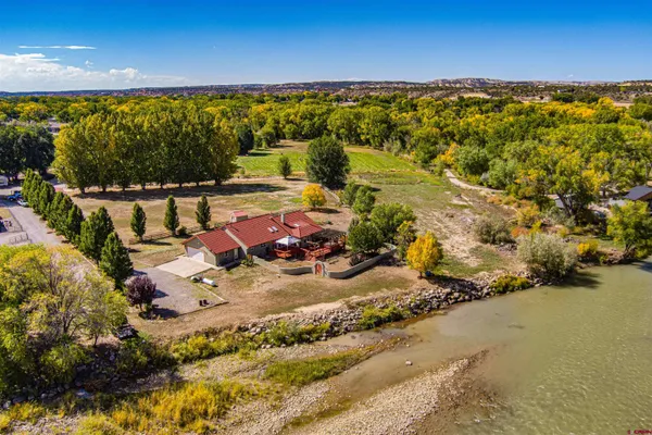 a view of a balcony with an ocean beach
