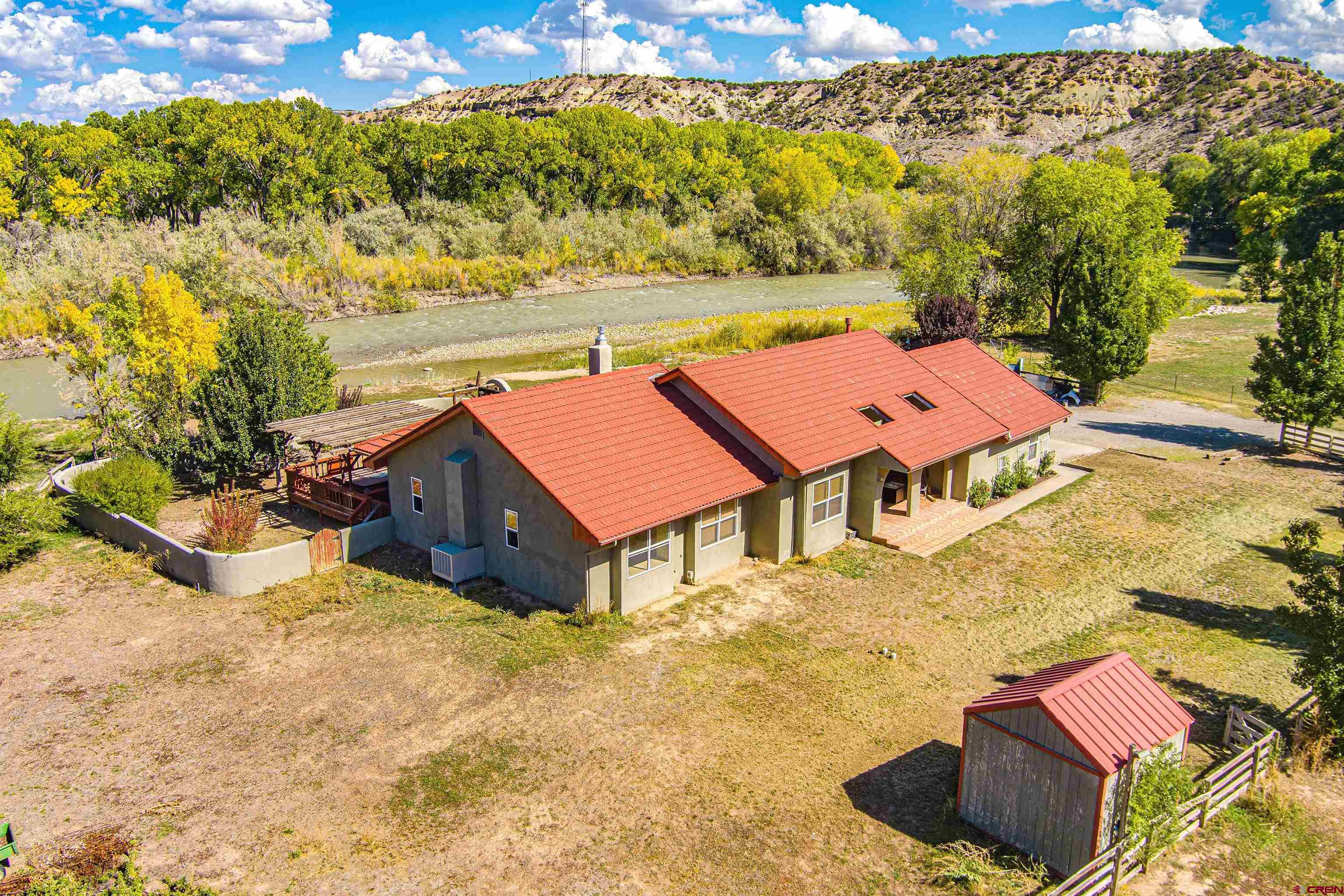 18 Road 2617 Aztec, NM 87410 - Photo 45 of 45 a backyard of a house with yard swimming pool and outdoor seating