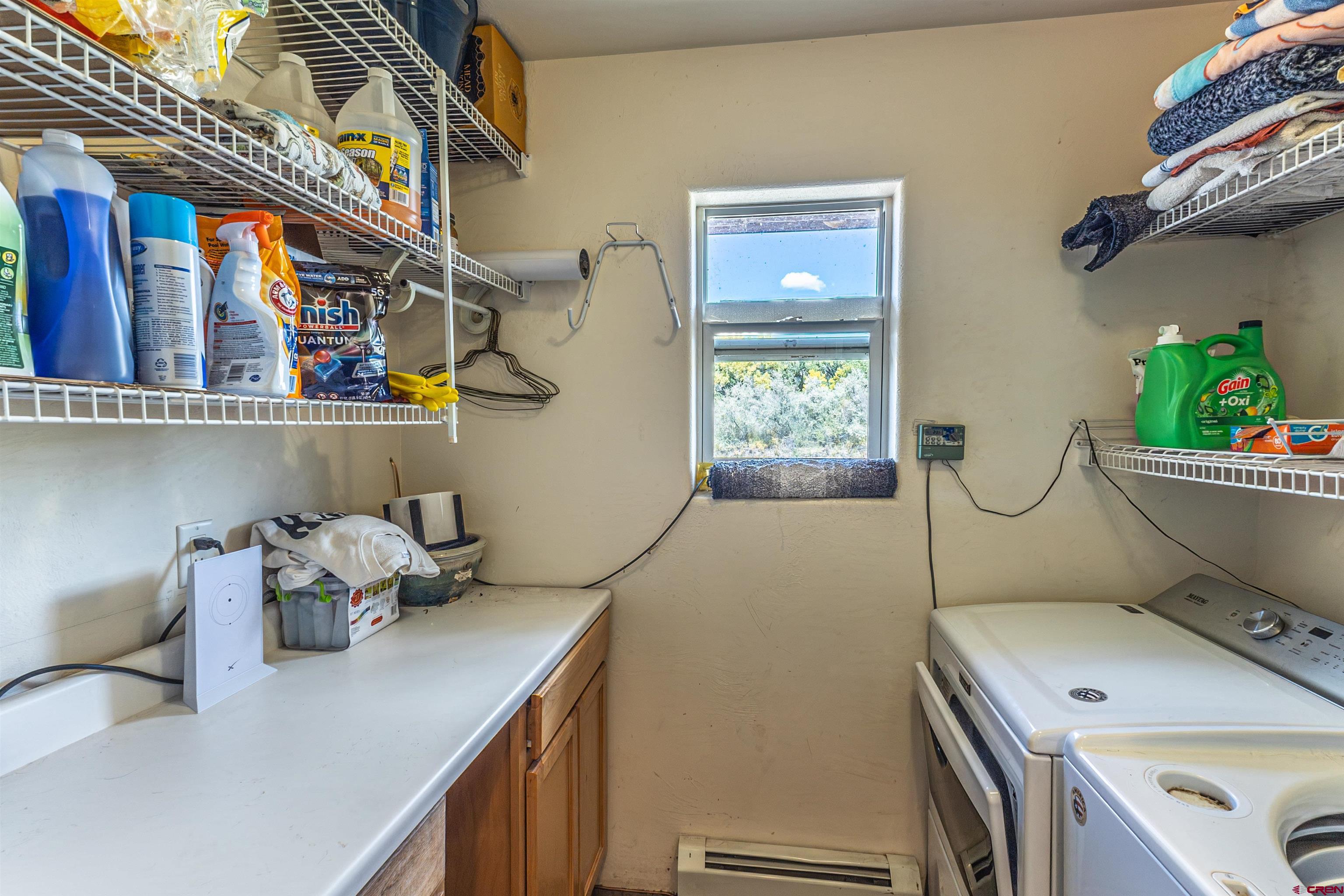 18 Road 2617 Aztec, NM 87410 - Photo 6 of 45 a room with a table chair and white walls