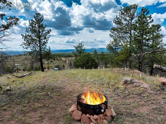 a view of a lake with mountains in the background