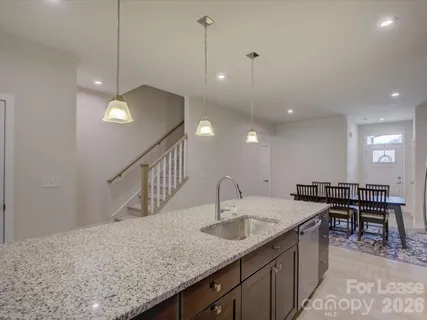 a kitchen with counter top space and a sink