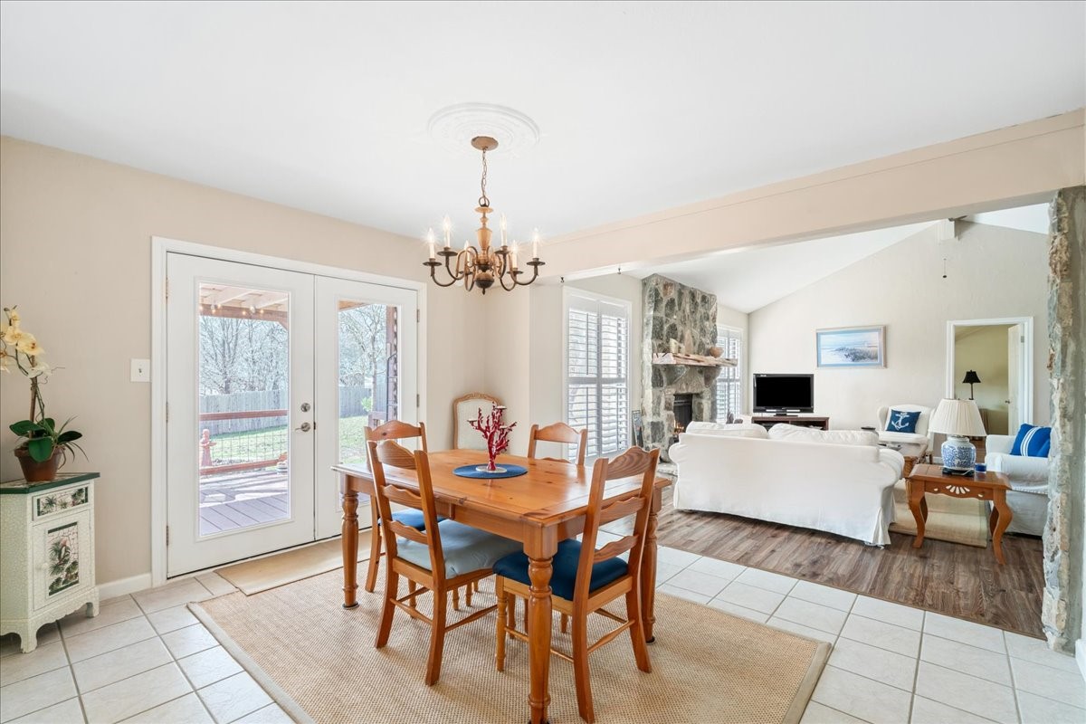 20 Saddle Rock Ridge Street Wimberley, TX 78676 - Photo 12 of 40 a view of a dining room with furniture