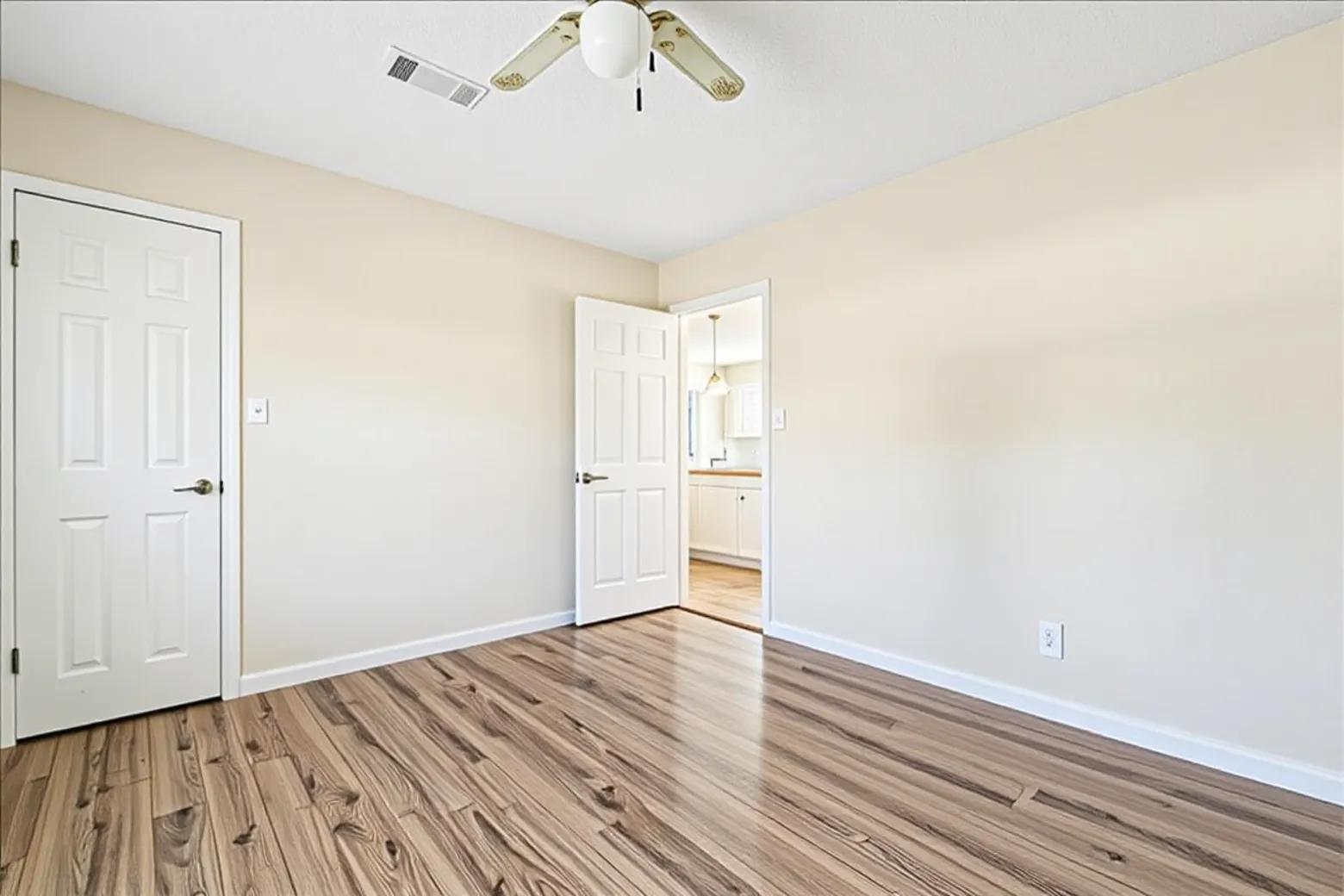 20 Saddle Rock Ridge Street Wimberley, TX 78676 - Photo 23 of 40 wooden floor in an empty room
