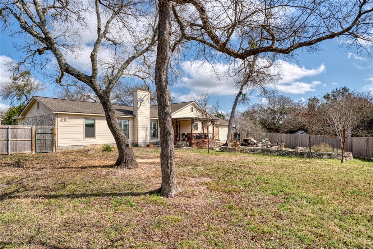 20 Saddle Rock Ridge Street Wimberley, TX 78676 - Photo 36 of 40 a view of a house with snow on the tree