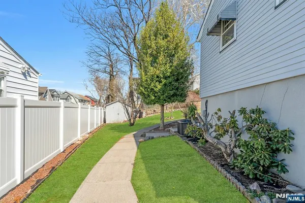 a view of a backyard with plants