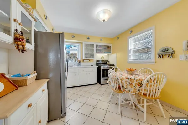 a kitchen with a cabinets and appliances