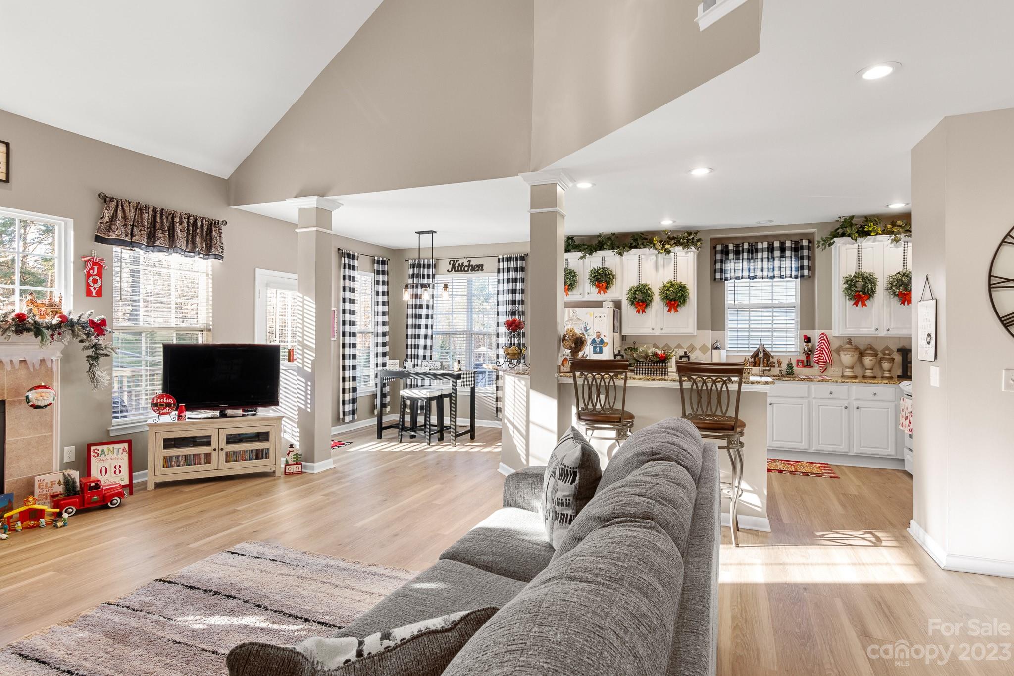 741 Knightswood Road Fort Mill, SC 29708 - Photo 19 of 47 a living room with furniture and a flat screen tv