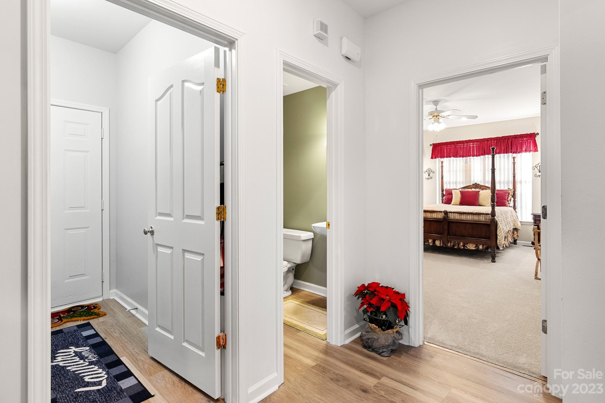741 Knightswood Road Fort Mill, SC 29708 - Photo 22 of 47 a bedroom with a bed and a potted plant