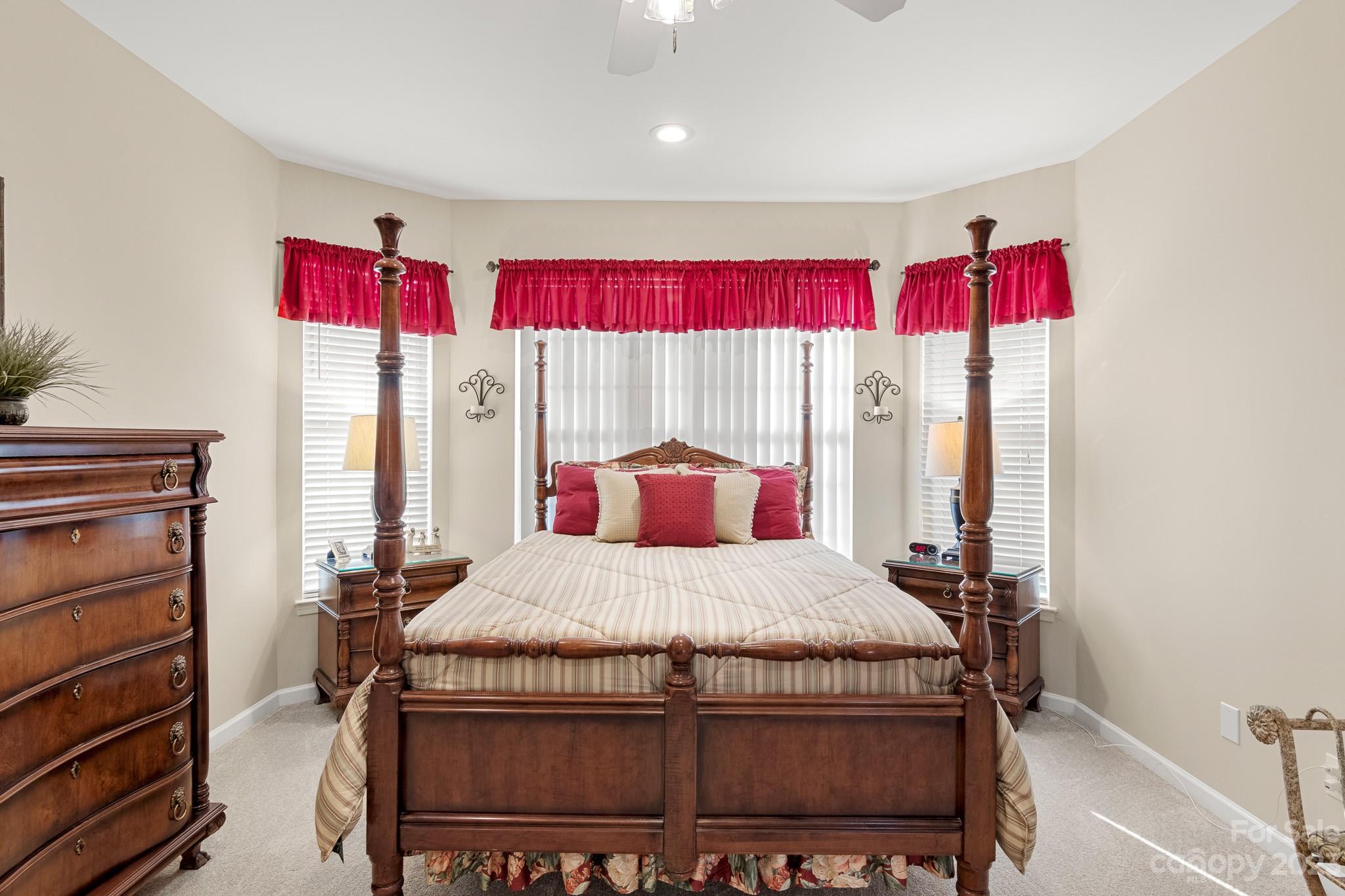 741 Knightswood Road Fort Mill, SC 29708 - Photo 24 of 47 a bedroom with a bed and window
