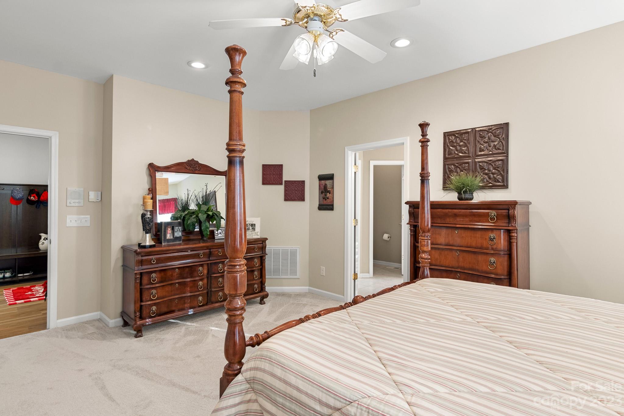 741 Knightswood Road Fort Mill, SC 29708 - Photo 25 of 47 a bedroom with a bed and a television