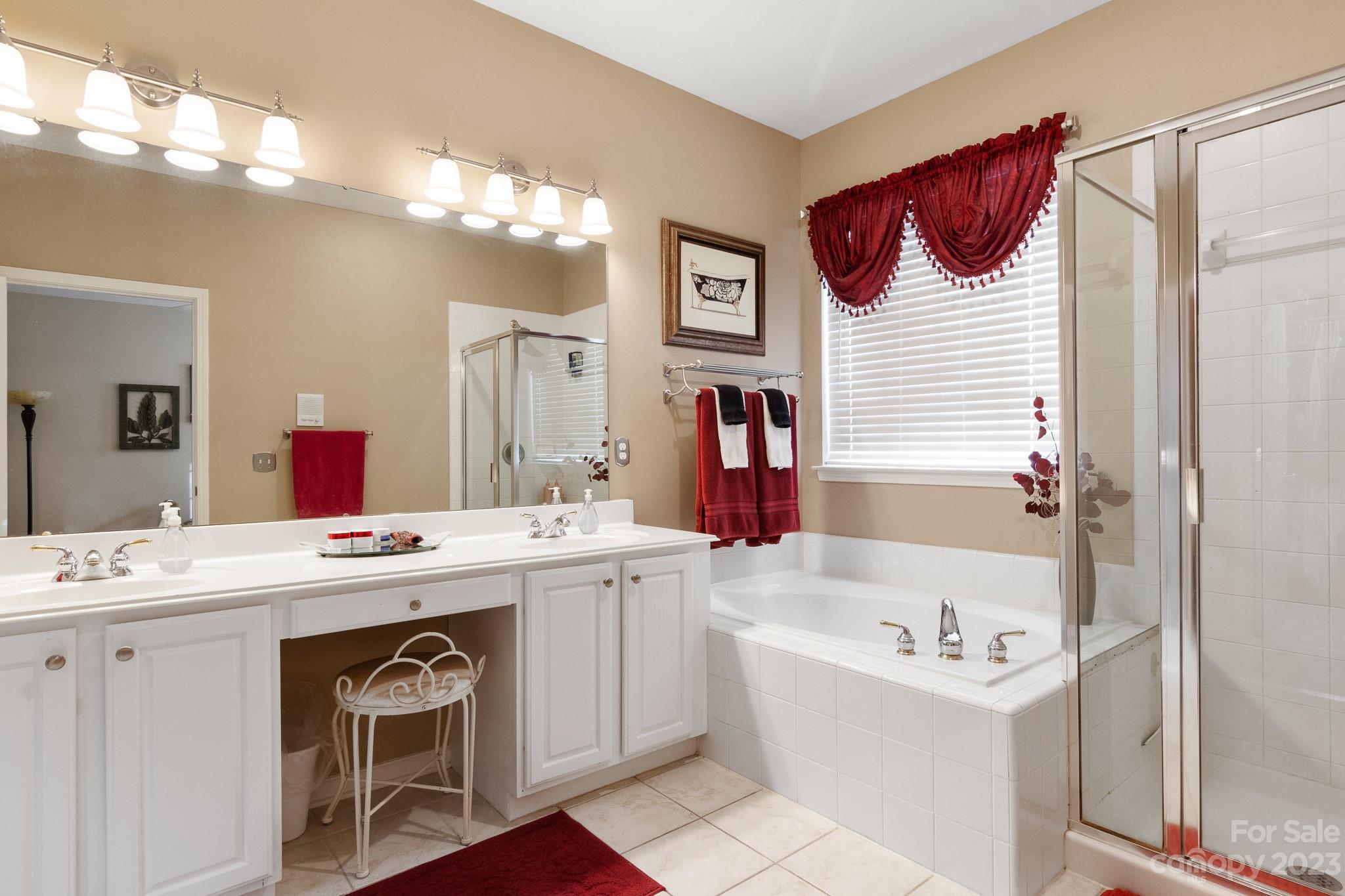 741 Knightswood Road Fort Mill, SC 29708 - Photo 26 of 47 a bathroom with a sink vanity and mirror