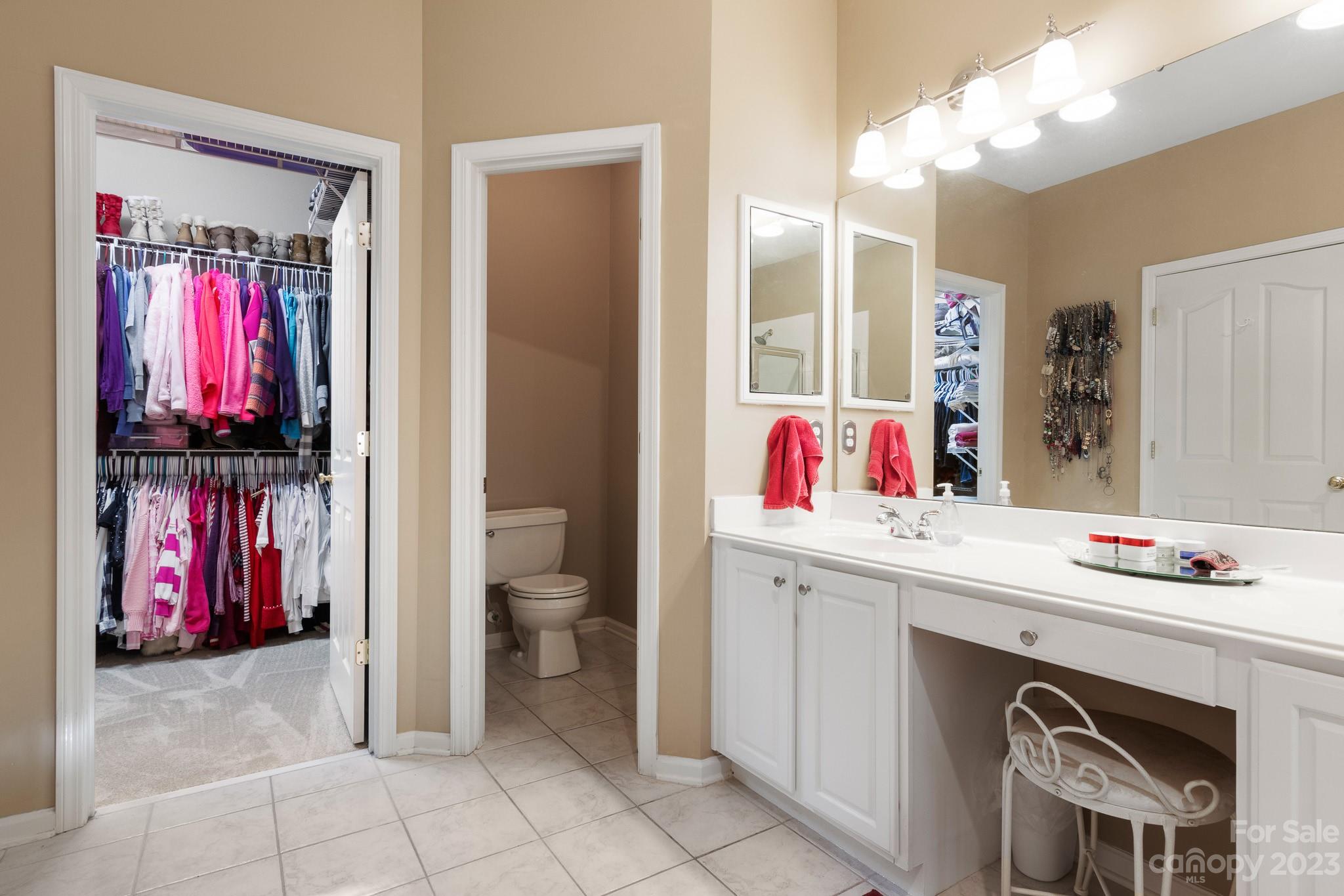 741 Knightswood Road Fort Mill, SC 29708 - Photo 27 of 47 a utility room with stainless steel appliances a sink and a window
