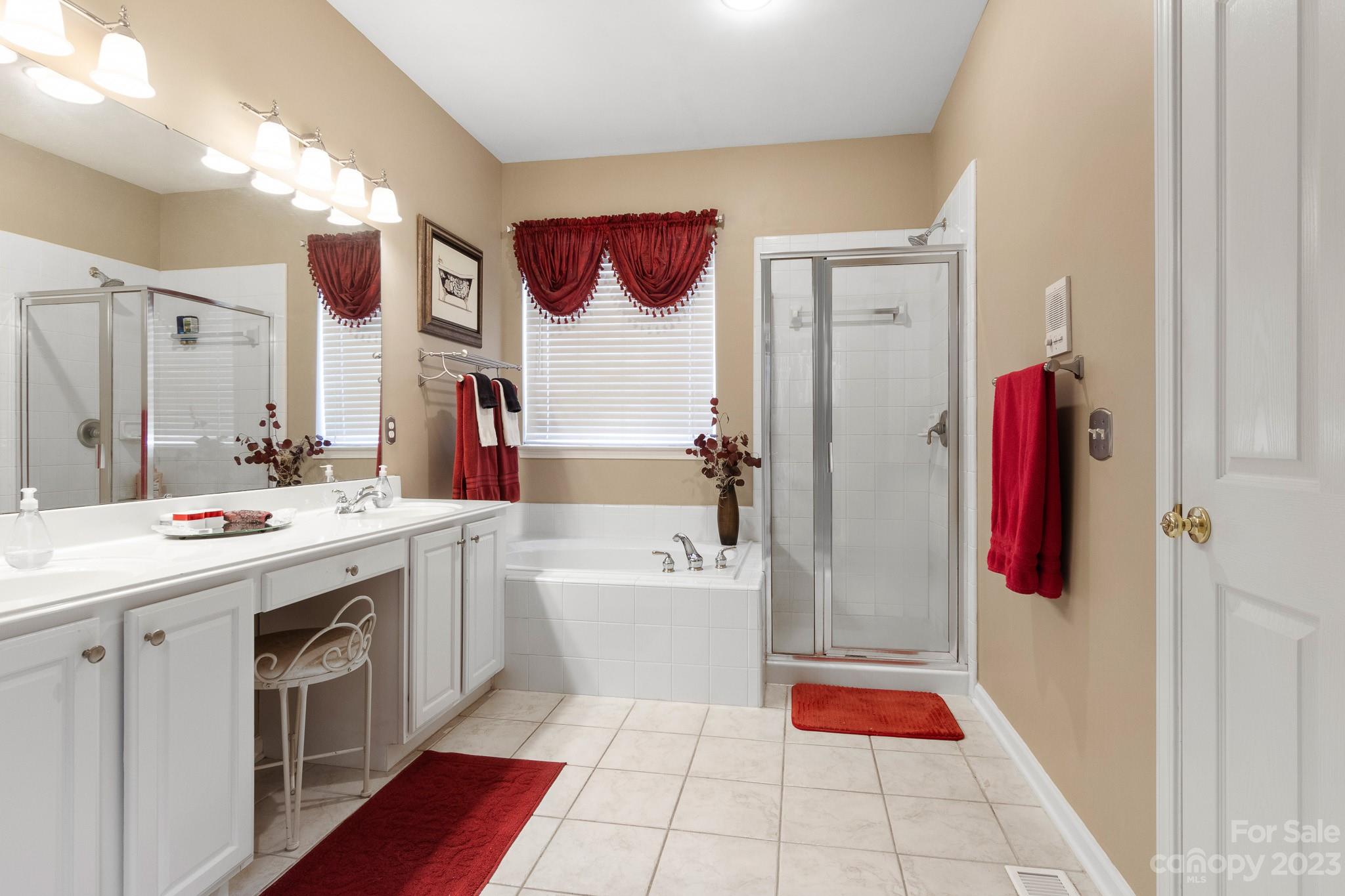 741 Knightswood Road Fort Mill, SC 29708 - Photo 28 of 47 a bathroom with a sink vanity and mirror