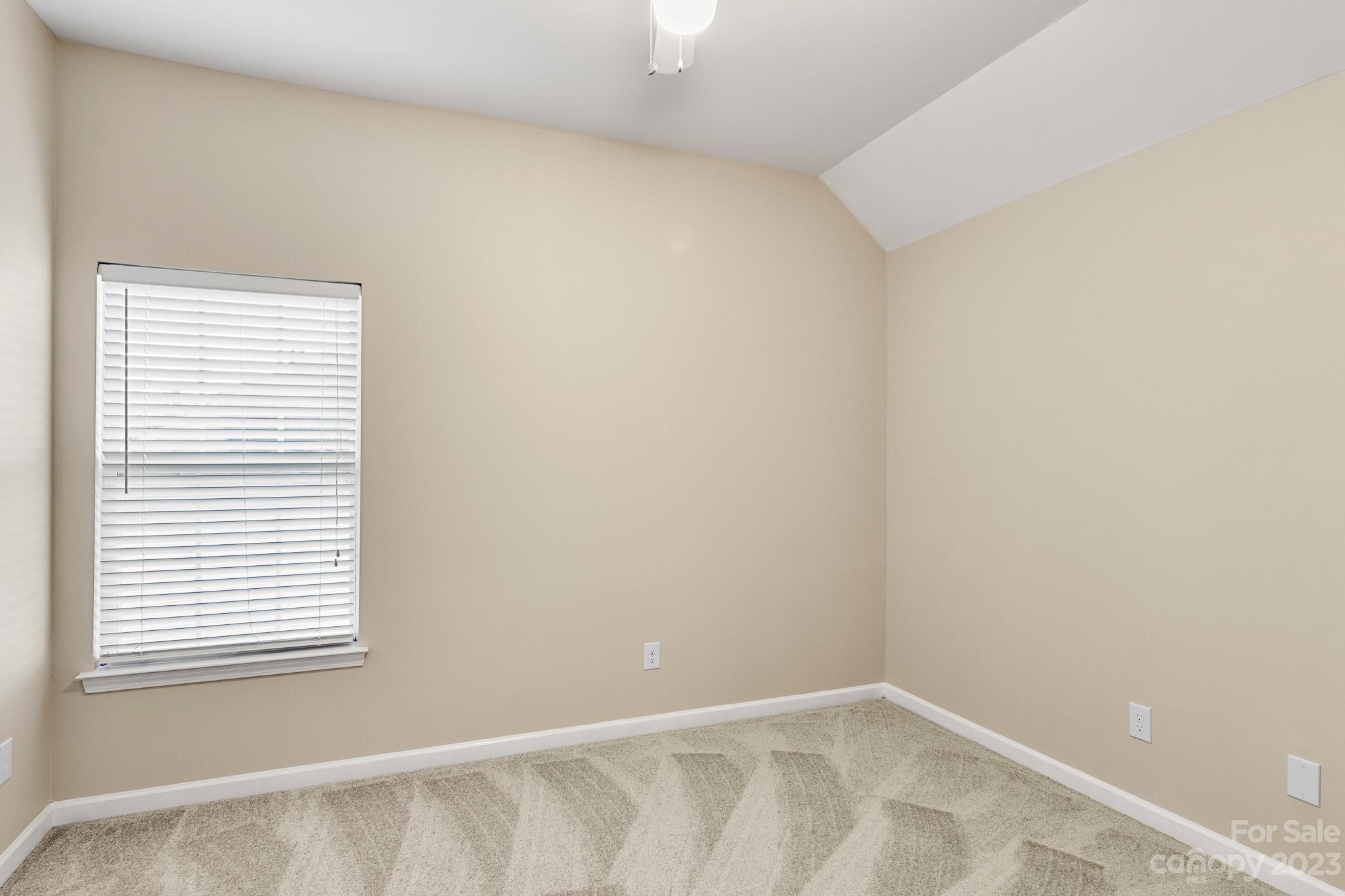 741 Knightswood Road Fort Mill, SC 29708 - Photo 30 of 47 a view of an empty room with a window
