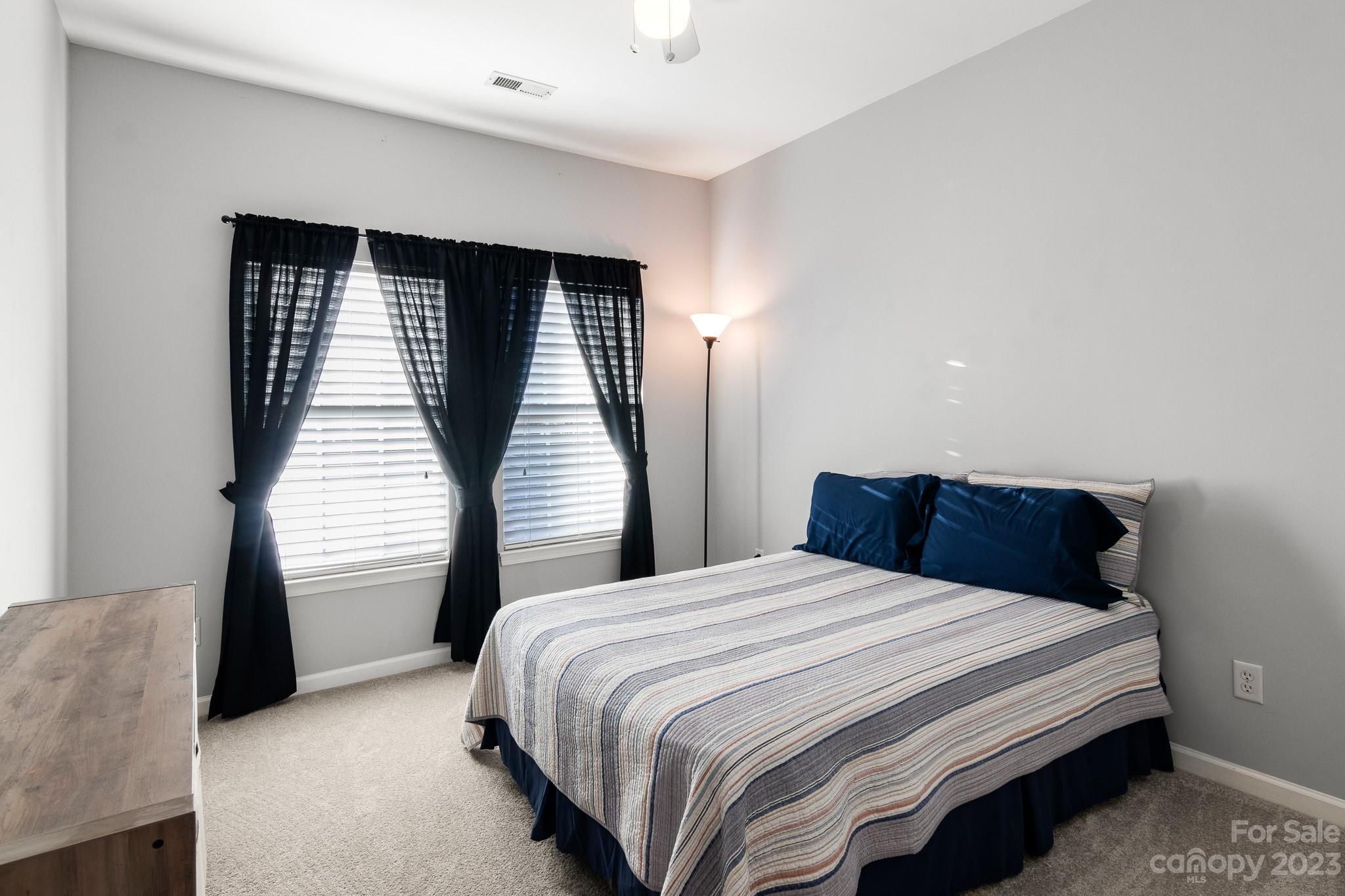 741 Knightswood Road Fort Mill, SC 29708 - Photo 37 of 47 a bedroom with a bed and a window