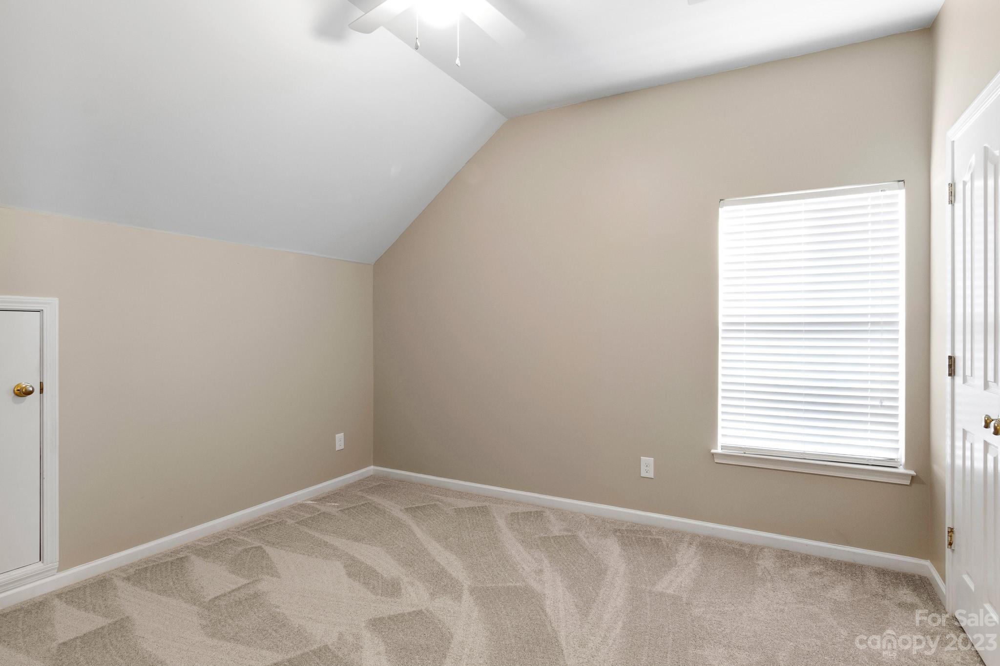 741 Knightswood Road Fort Mill, SC 29708 - Photo 42 of 47 a view of an empty room with a window