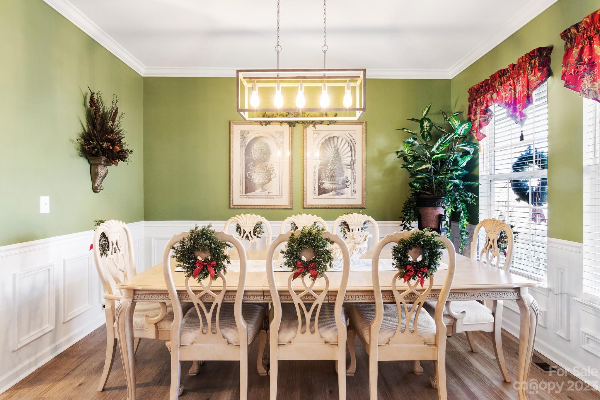 741 Knightswood Road Fort Mill, SC 29708 - Photo 7 of 47 a view of a dining room with furniture and a potted plant