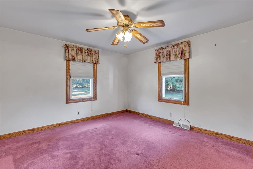 551 Engle Road Industry, PA 15052 - Photo 18 of 23 an empty room with windows and fan