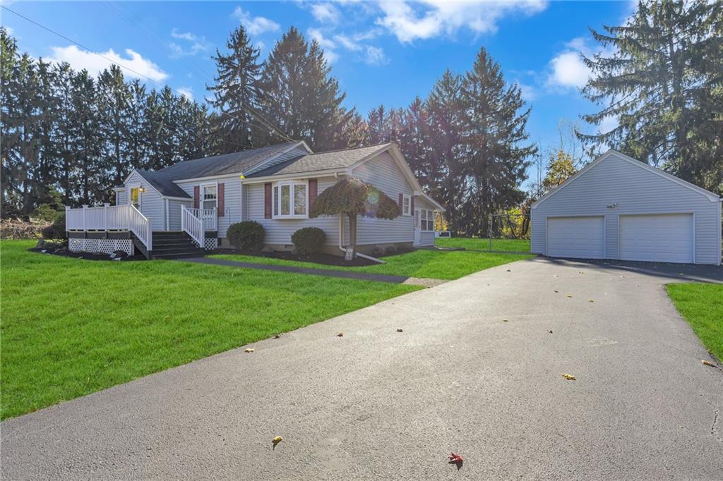 551 Engle Road Industry, PA 15052 - Photo 2 of 23 a view of a house with a yard and large tree