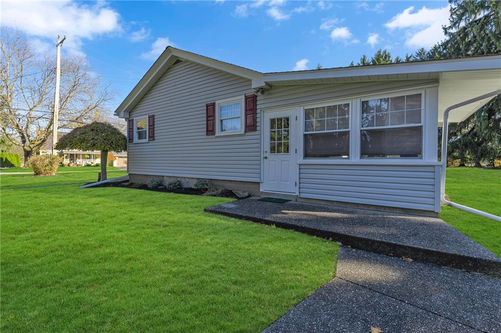 551 Engle Road Industry, PA 15052 - Photo 3 of 23 a front view of a house with a garden