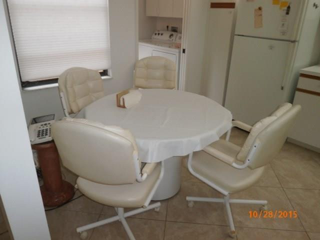 8431 Parkgate Road, Unit 8431 Boca Raton, FL 33496 - Photo 6 of 21 a bathroom with a toilet and a mirror