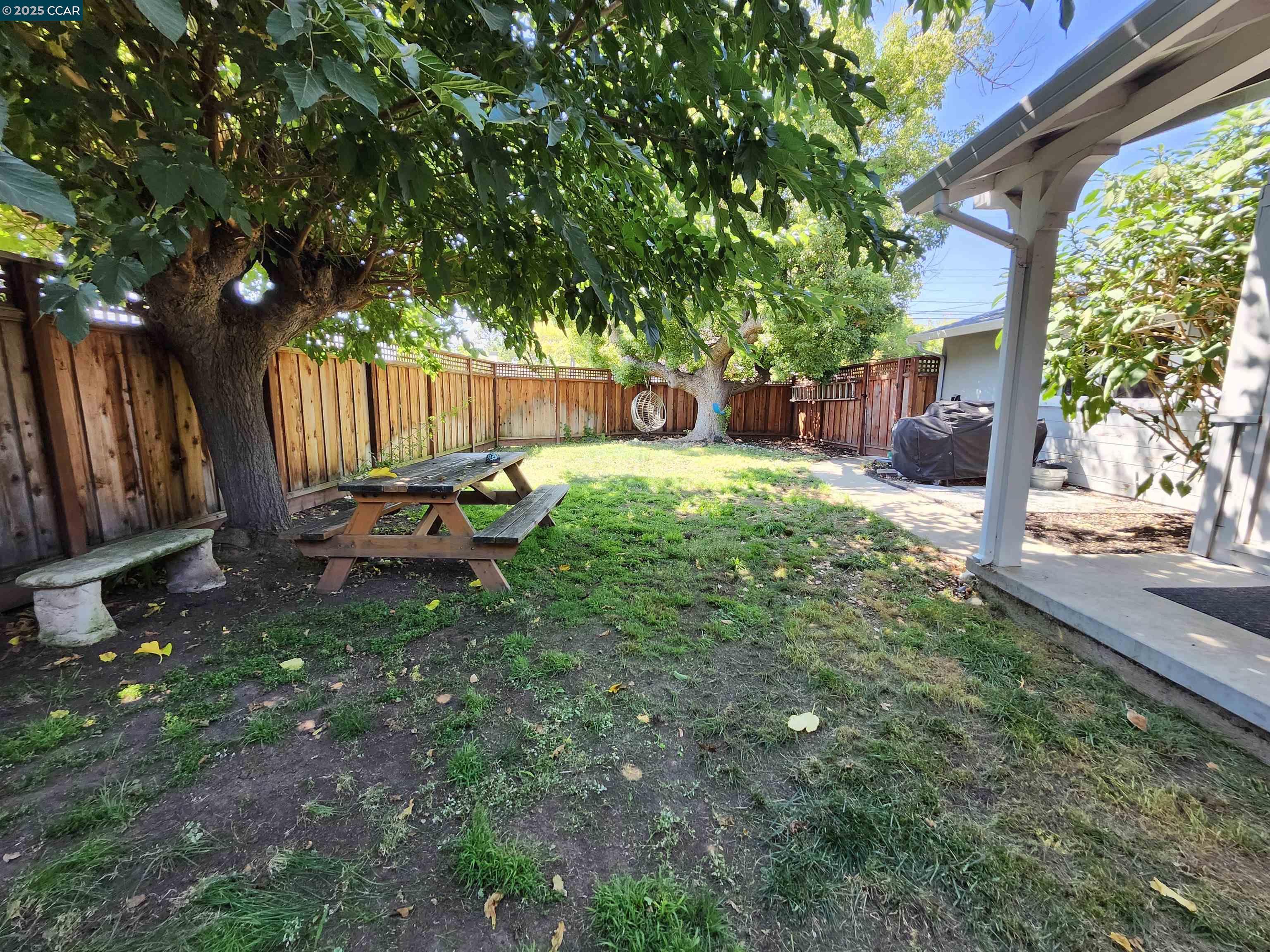 3479 Rose Court Concord, CA 94519 - Photo 58 of 60 a backyard of a house with barbeque oven table and chairs
