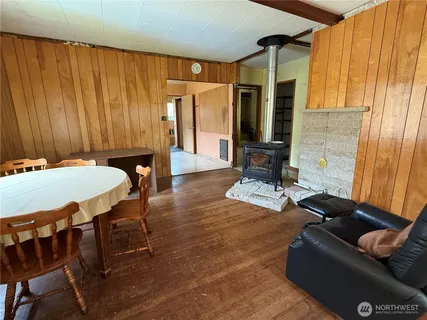 a kitchen with a stove sink and cabinets