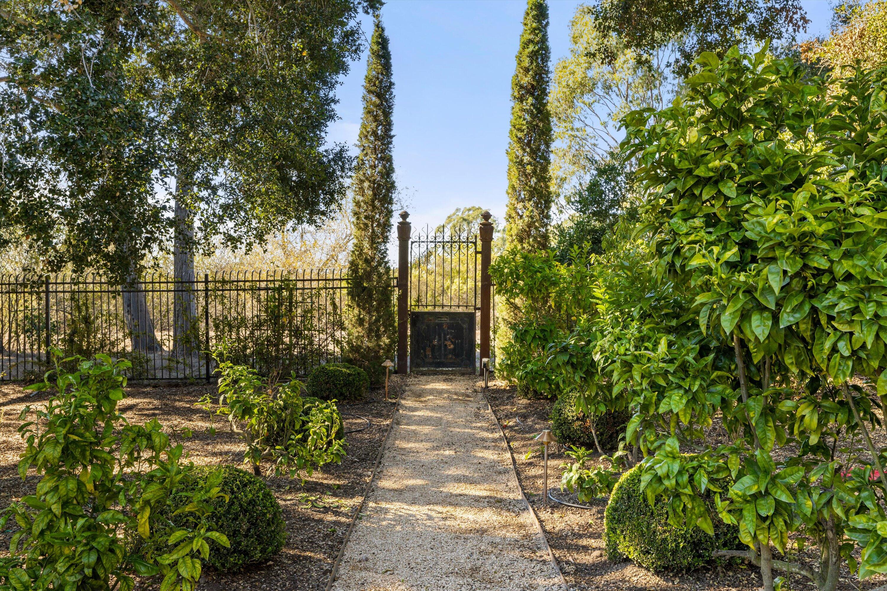 4689 Via Roblada Hope Ranch, CA 93110 - Photo 27 of 30 Private gate to More Mesa