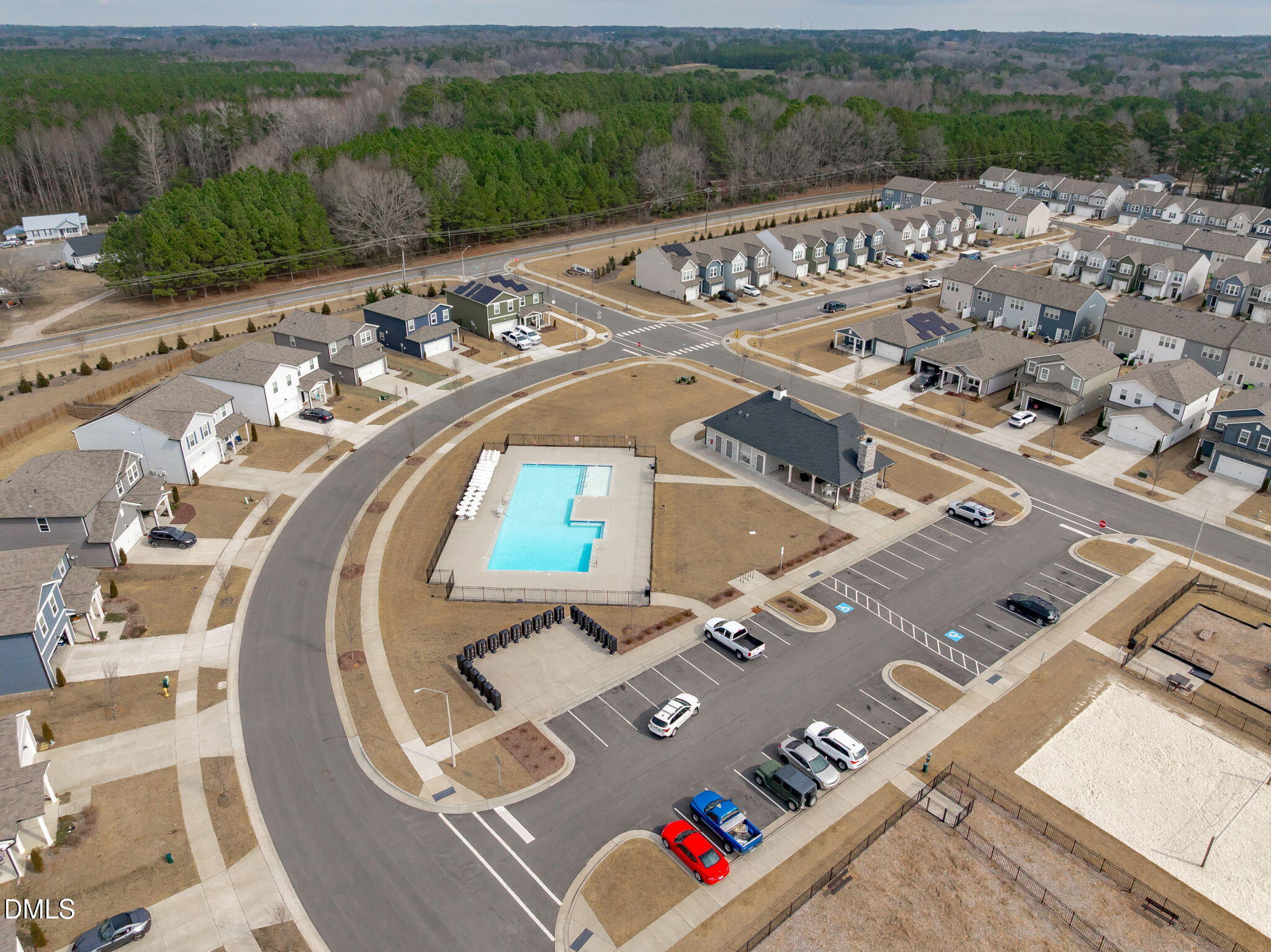 481 Campbell Rdg Place Wendell, NC 27591 - Photo 36 of 46 Clubhouse, pool, dog park, volleyball pit, and playground.