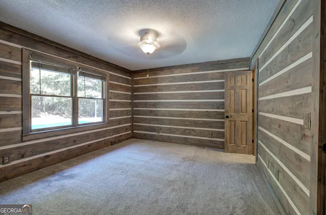 a view of room with walk in closet