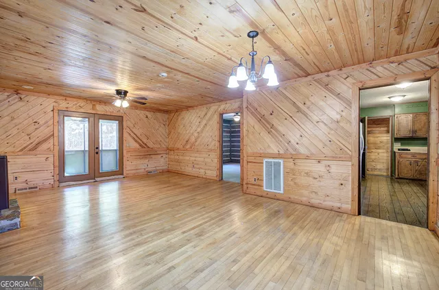 a view interior of a house an entryway and fire place