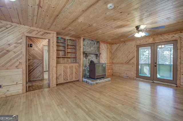 a view of a livingroom with wooden floor
