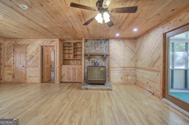 a view of a livingroom with wooden floor