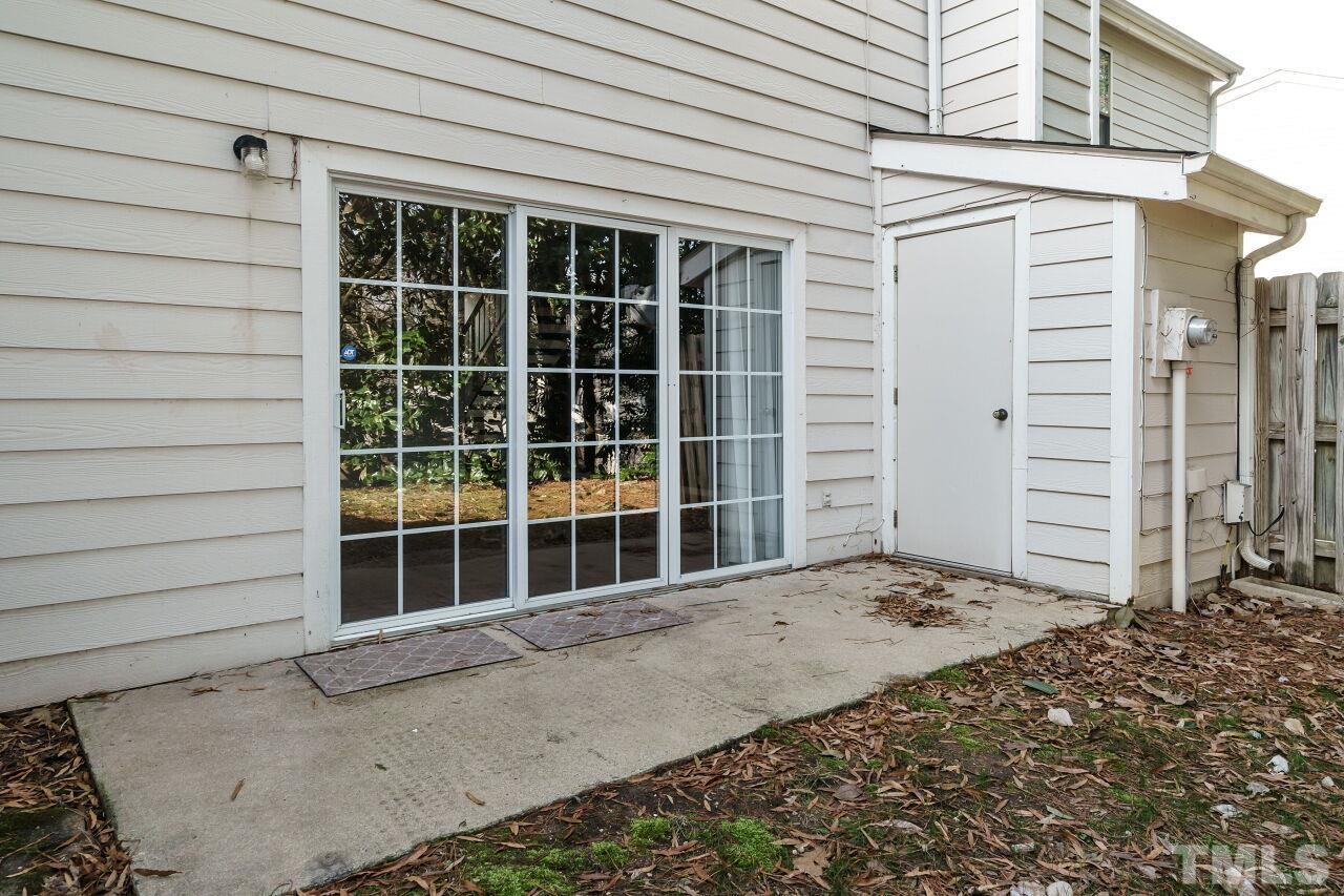 7906 Falcon Rest Circle Raleigh, NC 27615 - Photo 18 of 20 a front view of a house with a window
